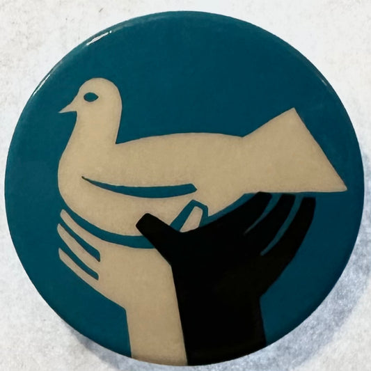 Peace Dove held up by Black and White Hands